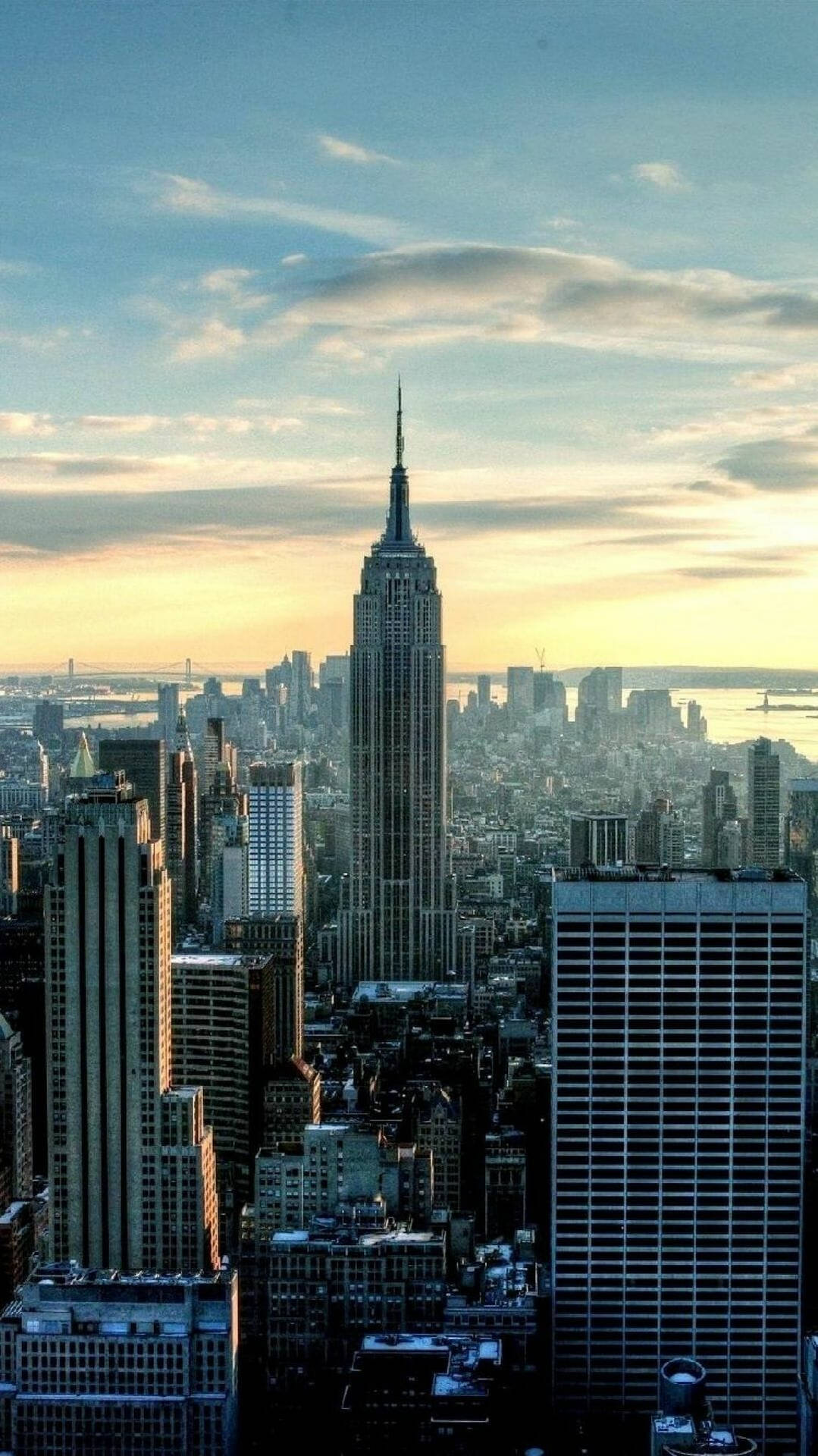 A View Of The Empire State Building And New York City Background