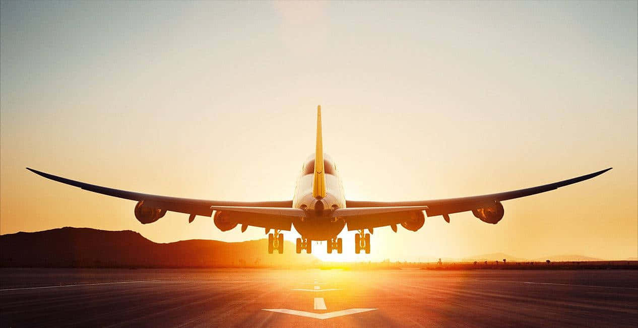 A View Of The Majestic Sky With A Cool Plane Flying In It Background