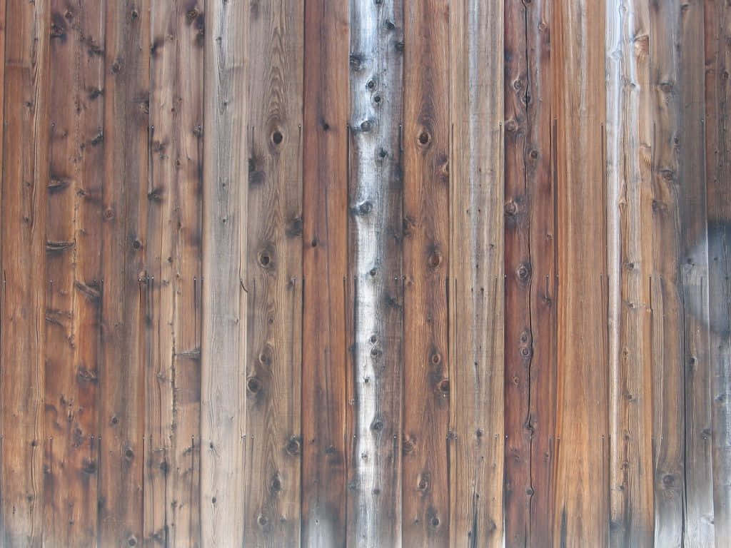 A View Of Weathered Barn Wood Planks Background