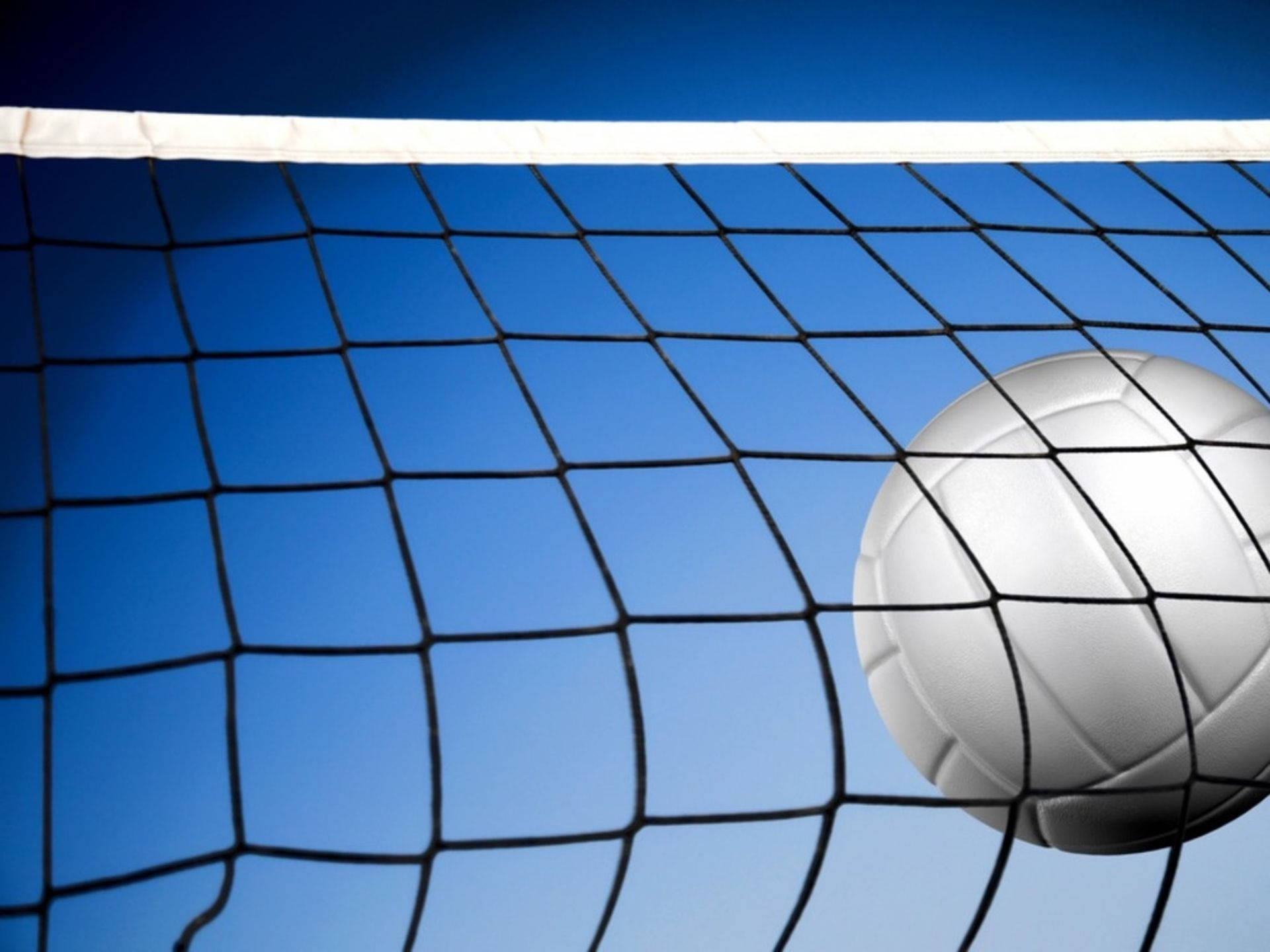 A Volleyball Ball Is Hitting The Net Background