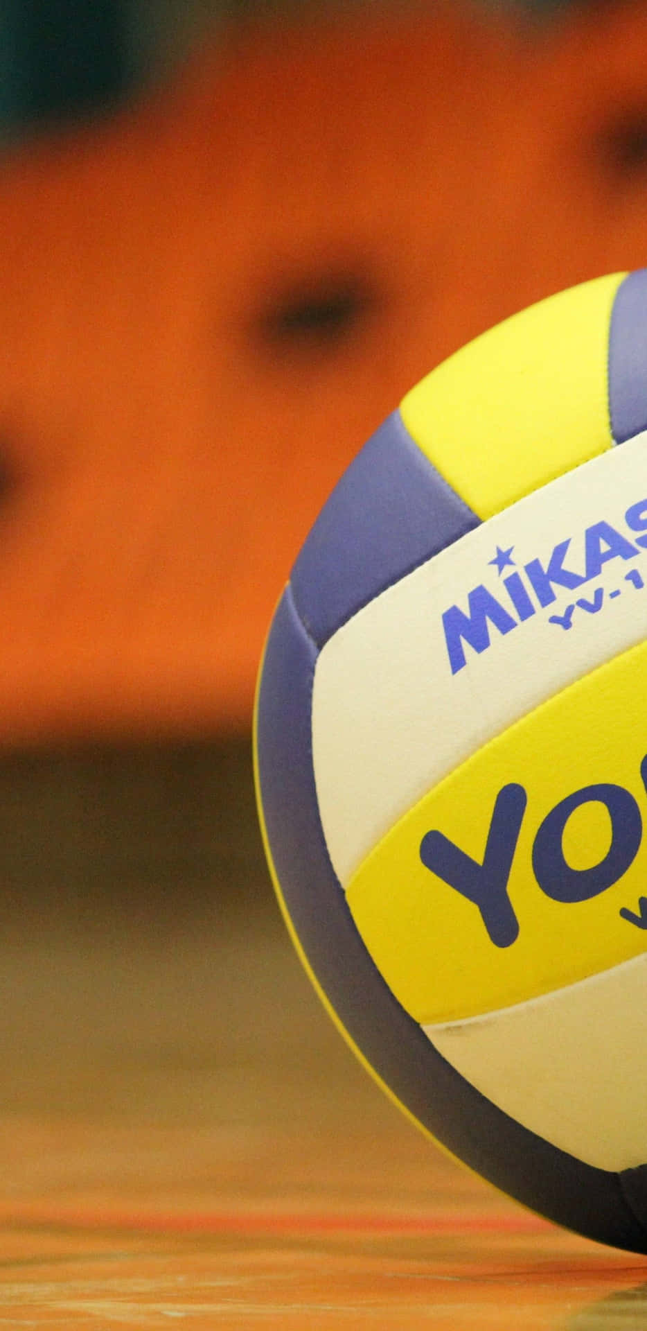 A Volleyball Ball On A Court Background