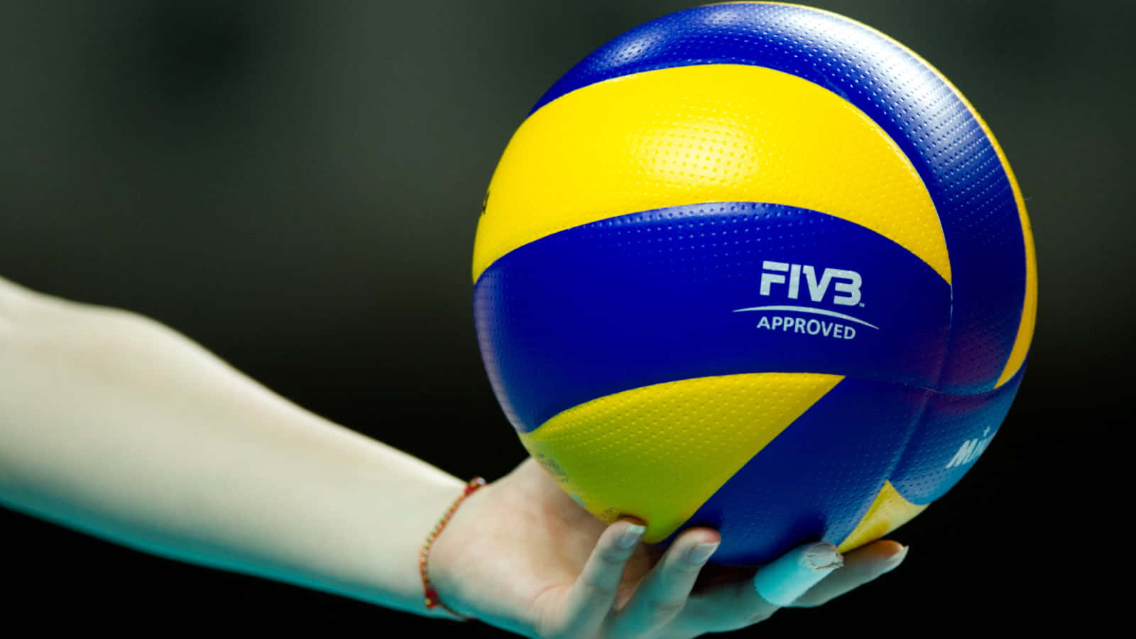 A Volleyball Soars Through The Air Background