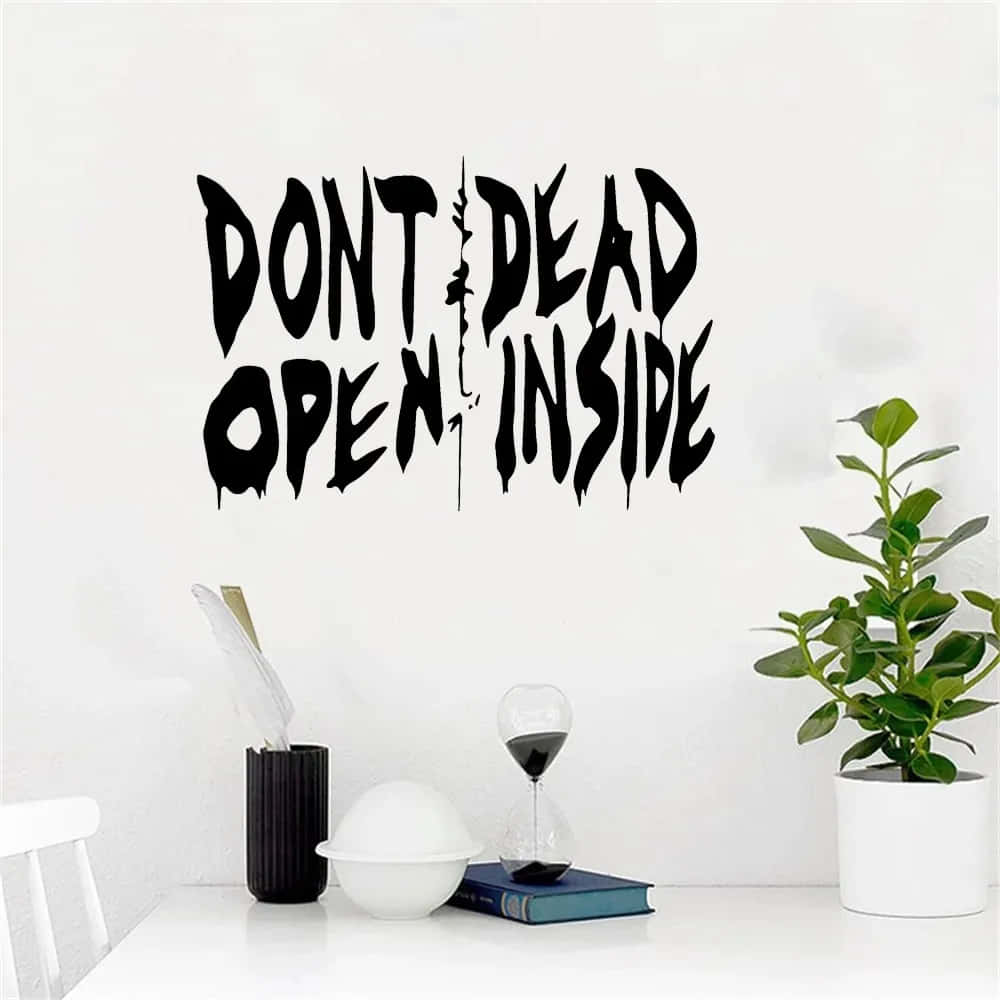 A Wall Sticker With The Words Don't Dead Open Inside