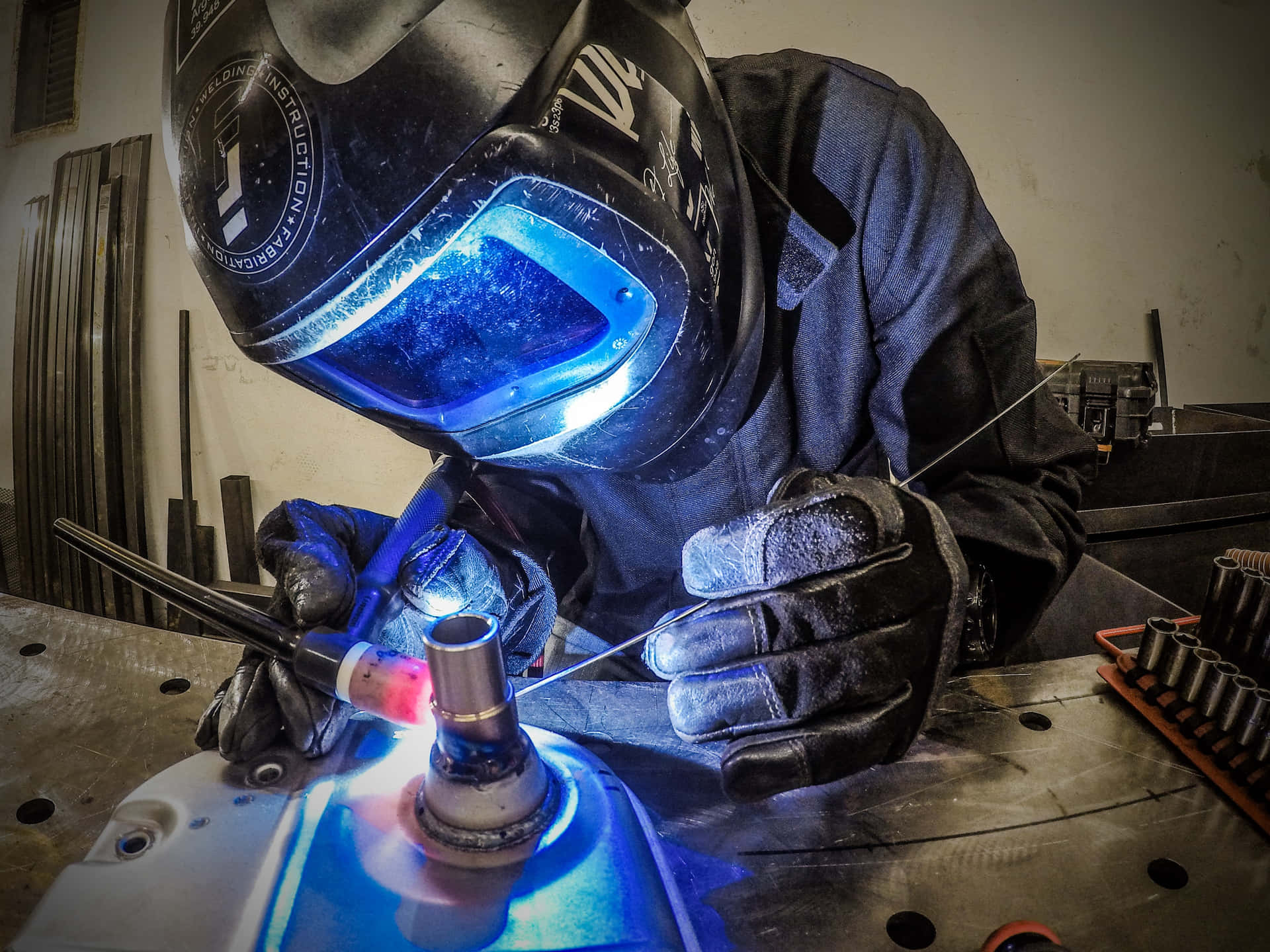 A Welder Working On A Metal Piece