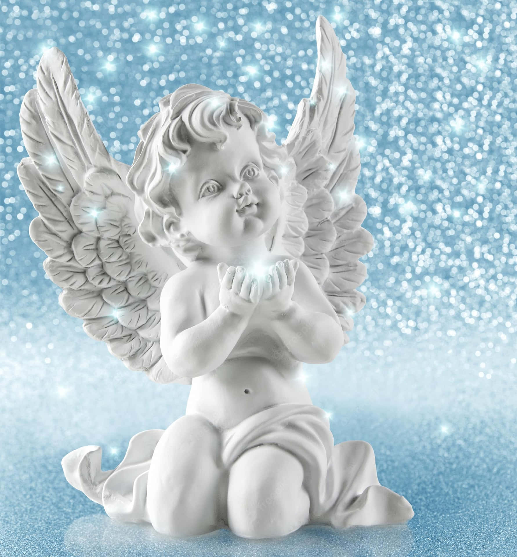 A White Angel Figurine Is Sitting On A Blue Background Background