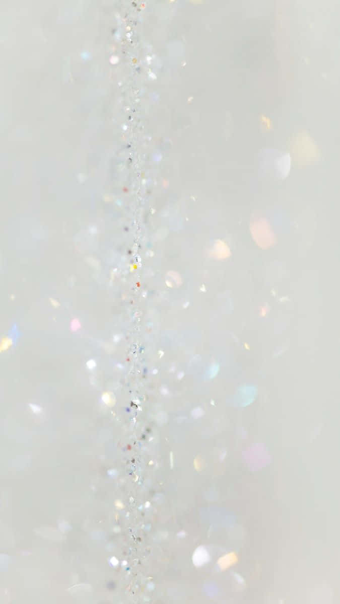A White Background With A Lot Of Sparkles Background