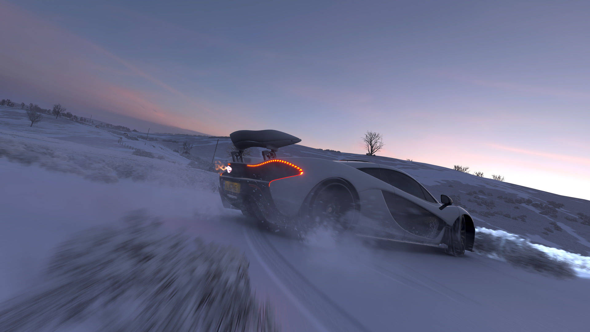 A White Car Driving Down A Snowy Road Background