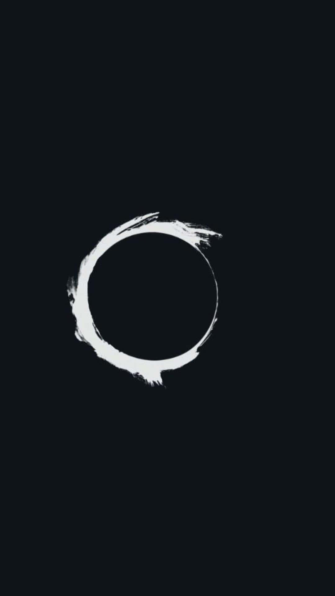 A White Circle On A Black Background Background