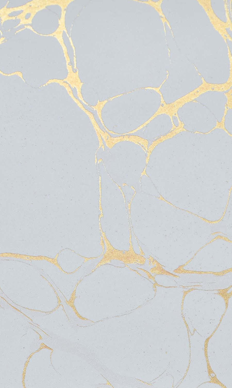A White Marble With Gold And Silver Paint Background