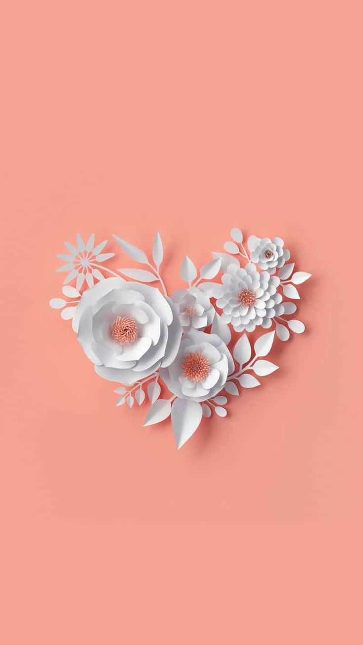 A White Paper Heart With Flowers On A Pink Background Background
