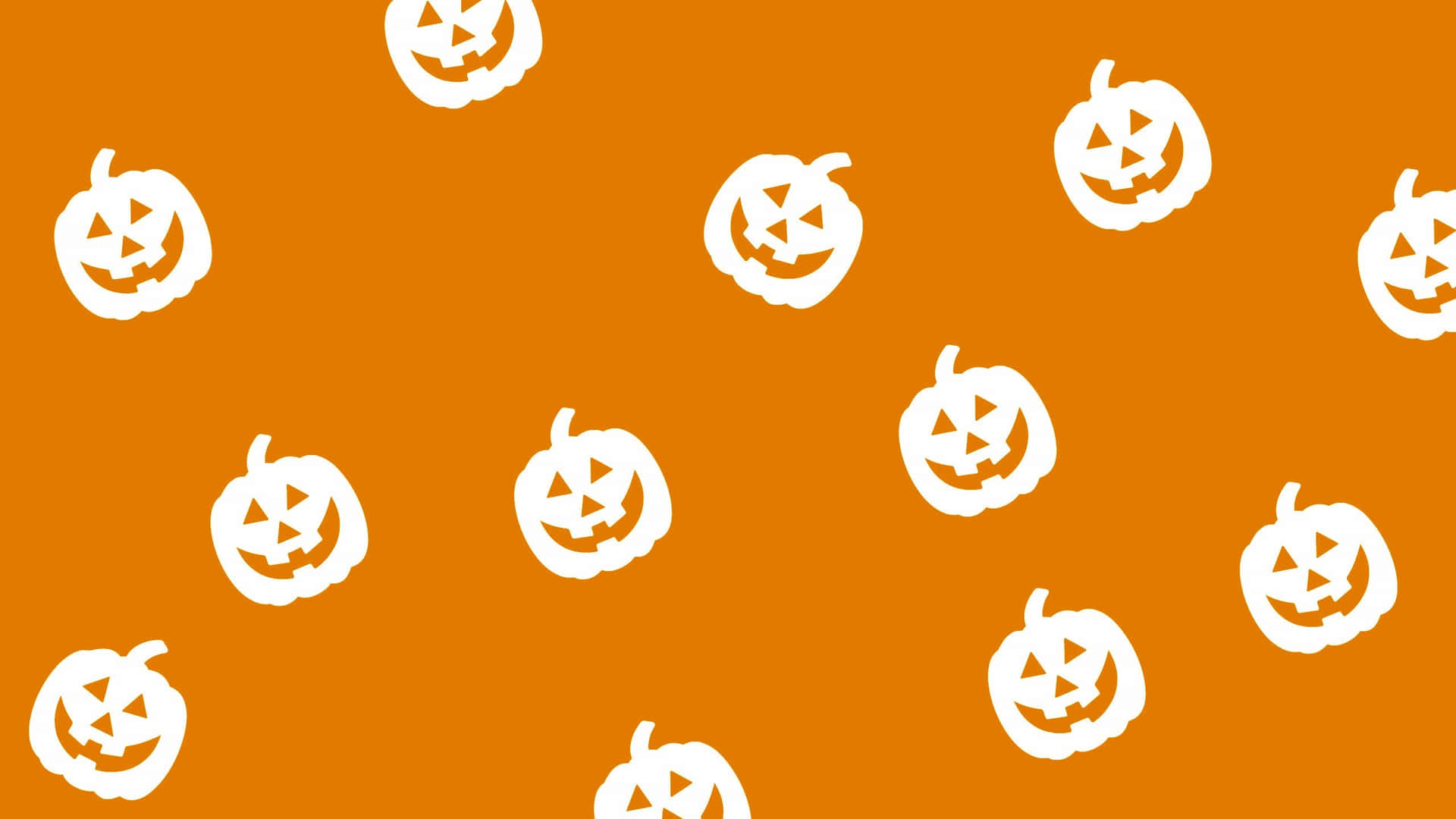 A White Pumpkin Pattern On An Orange Background