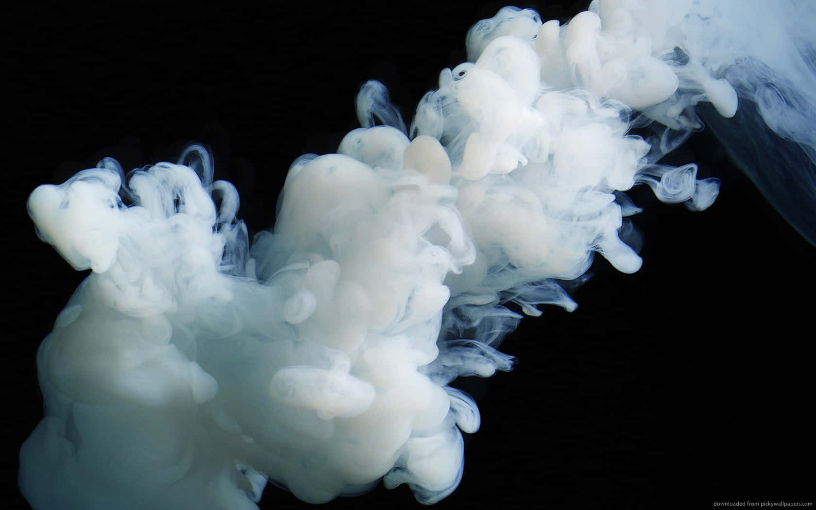 A White Smoke Is Floating In The Air Background
