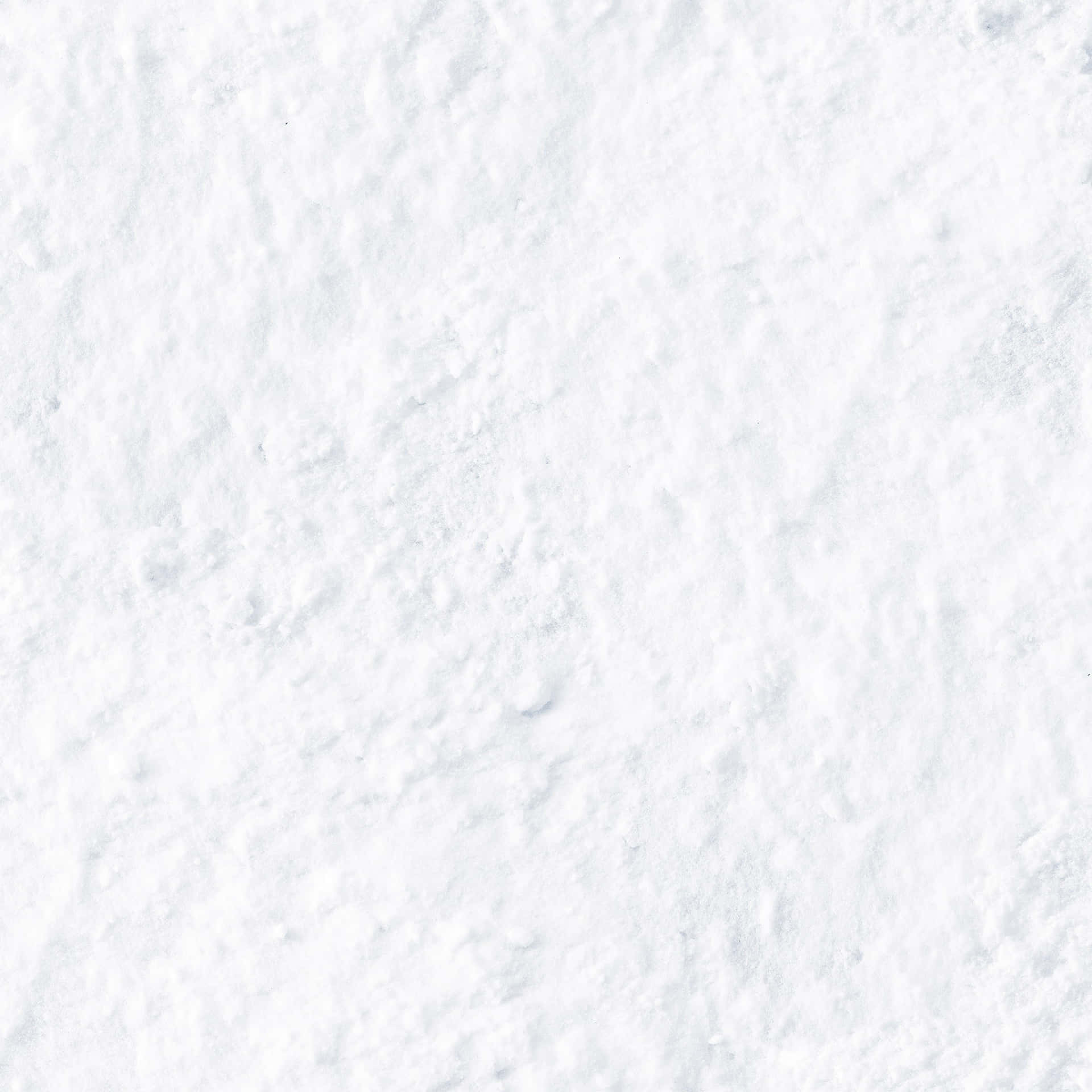 A White Snowy Background With A Snowflake