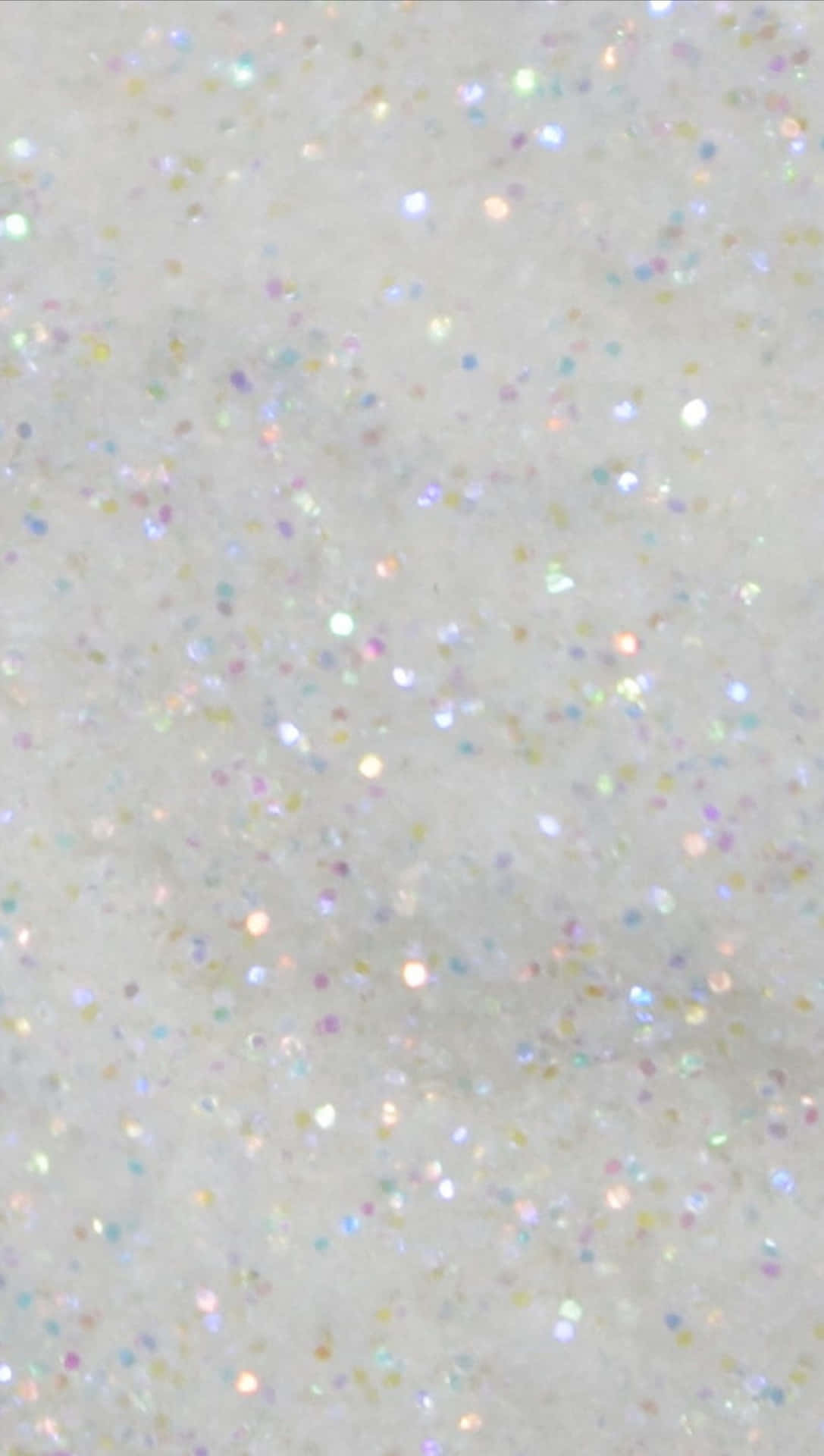 A White Surface With A Lot Of Glitter Background