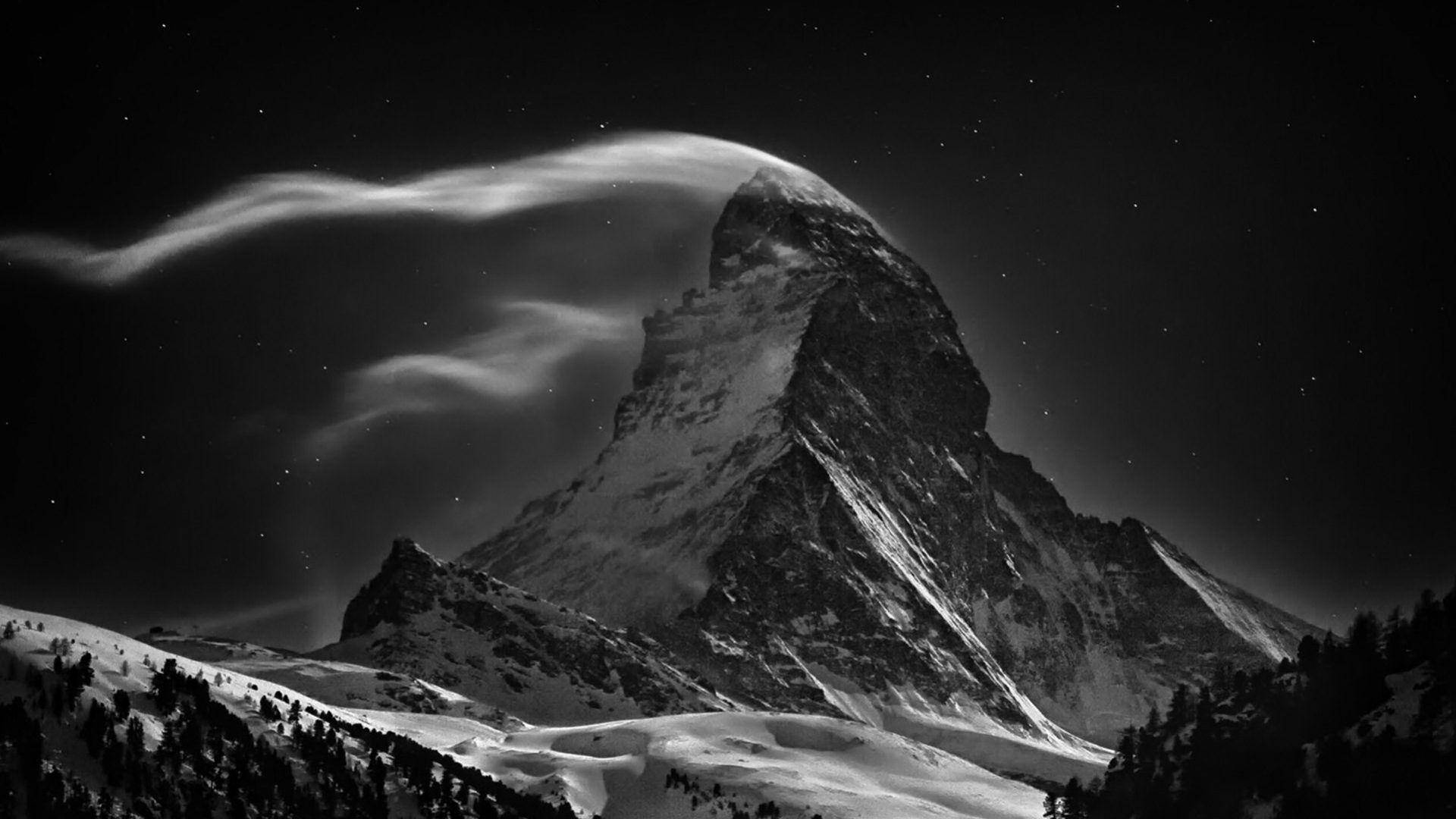 A Windy Snowy Mountain During Winter Background