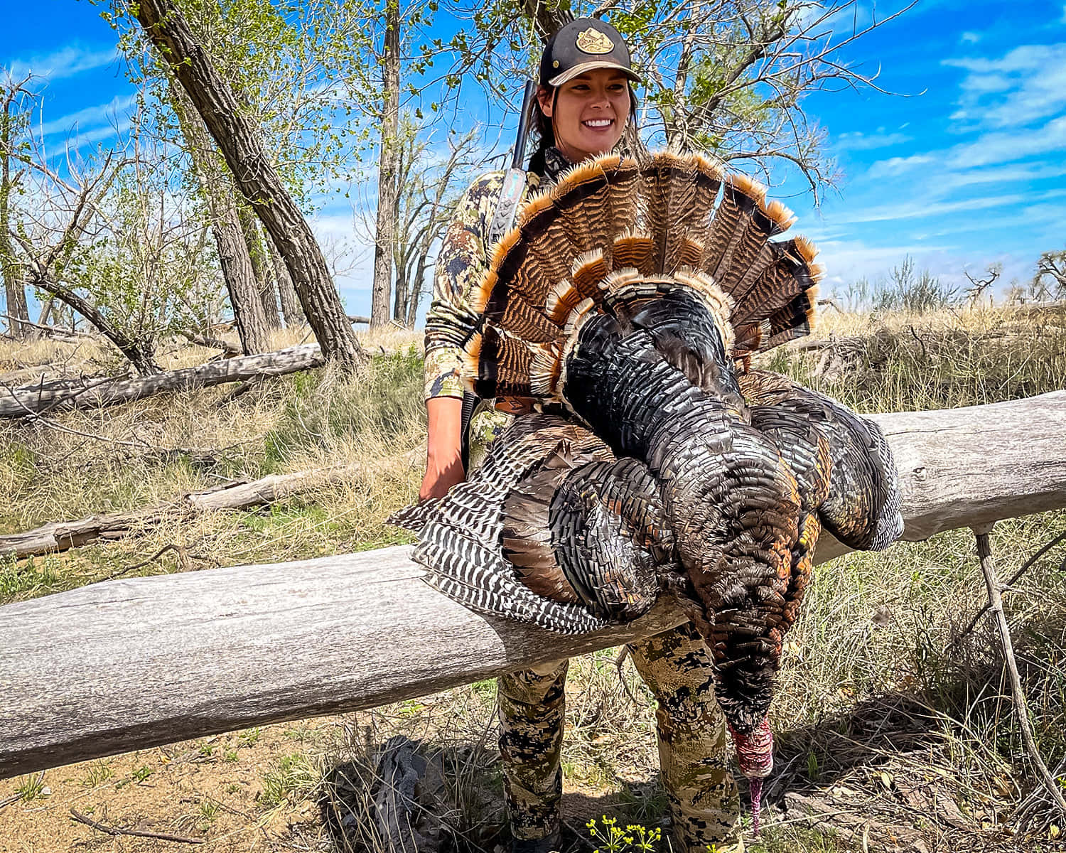 A Woman Holding A Turkey Background