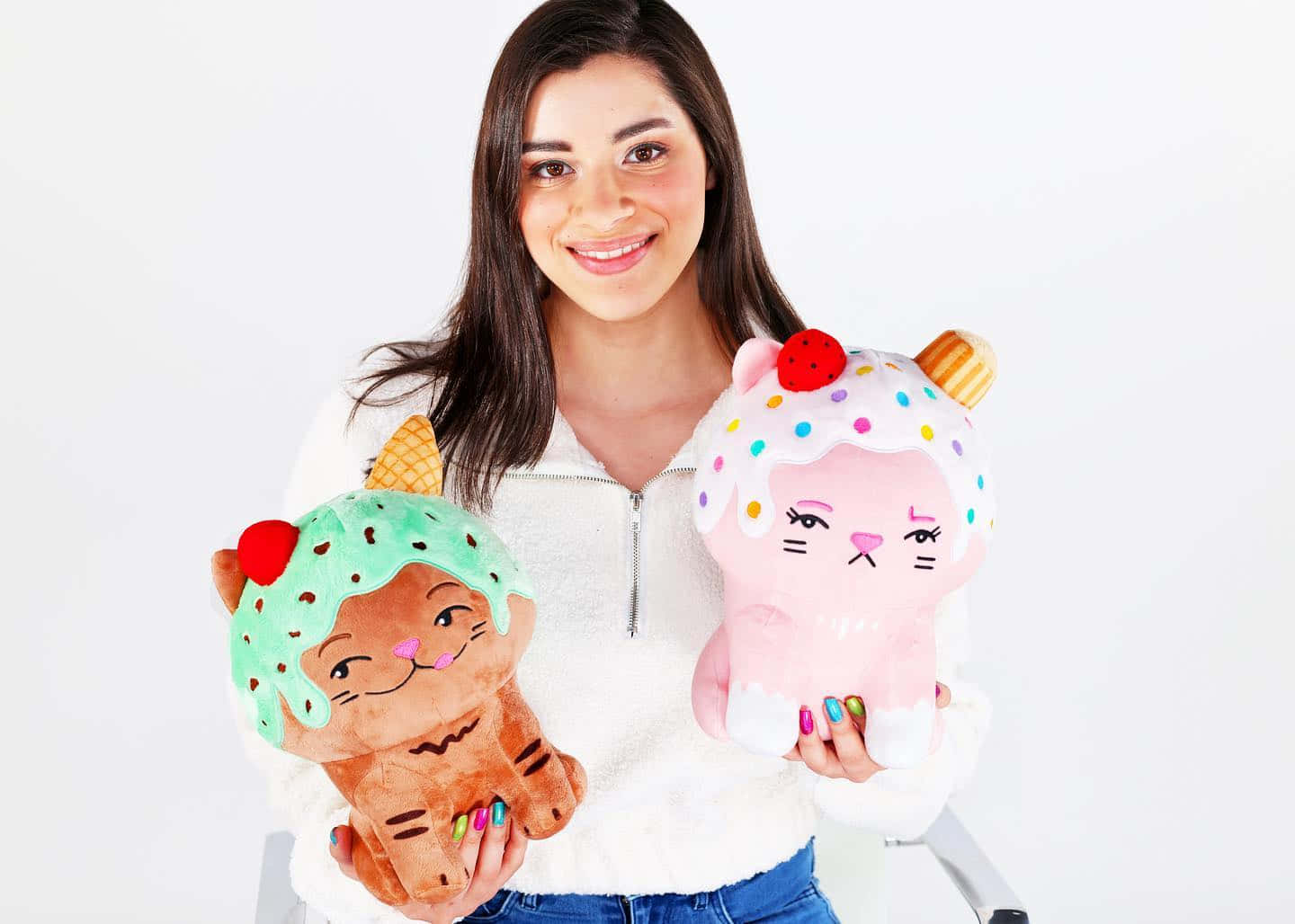 A Woman Holding Two Stuffed Animals Background