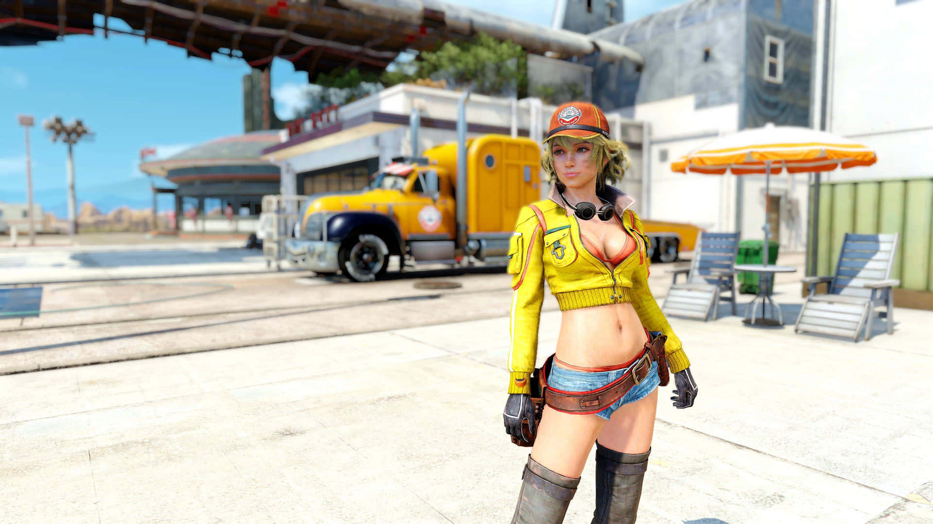 A Woman In A Yellow Shirt And Boots Is Standing In Front Of A Truck Background