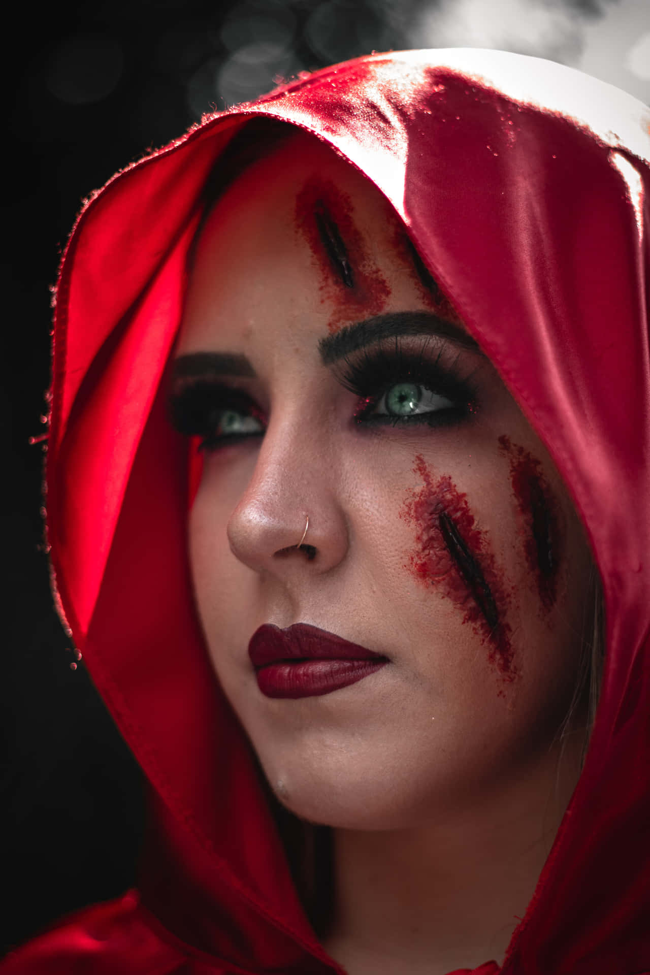 A Woman In Red Riding Hood Makeup