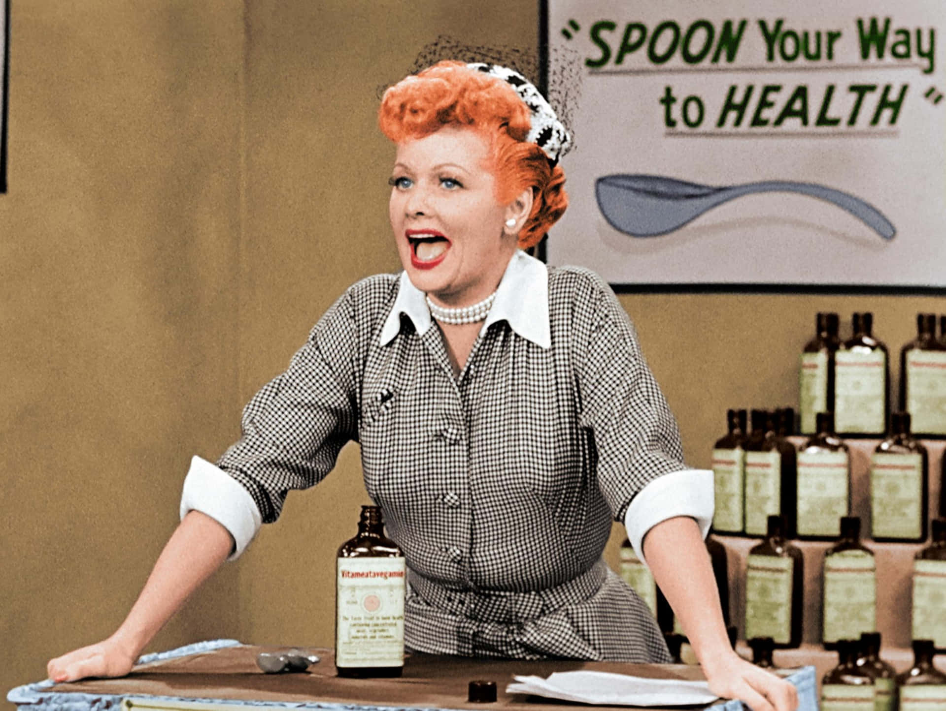 A Woman Is Standing In Front Of A Counter With Bottles Of Medicine Background