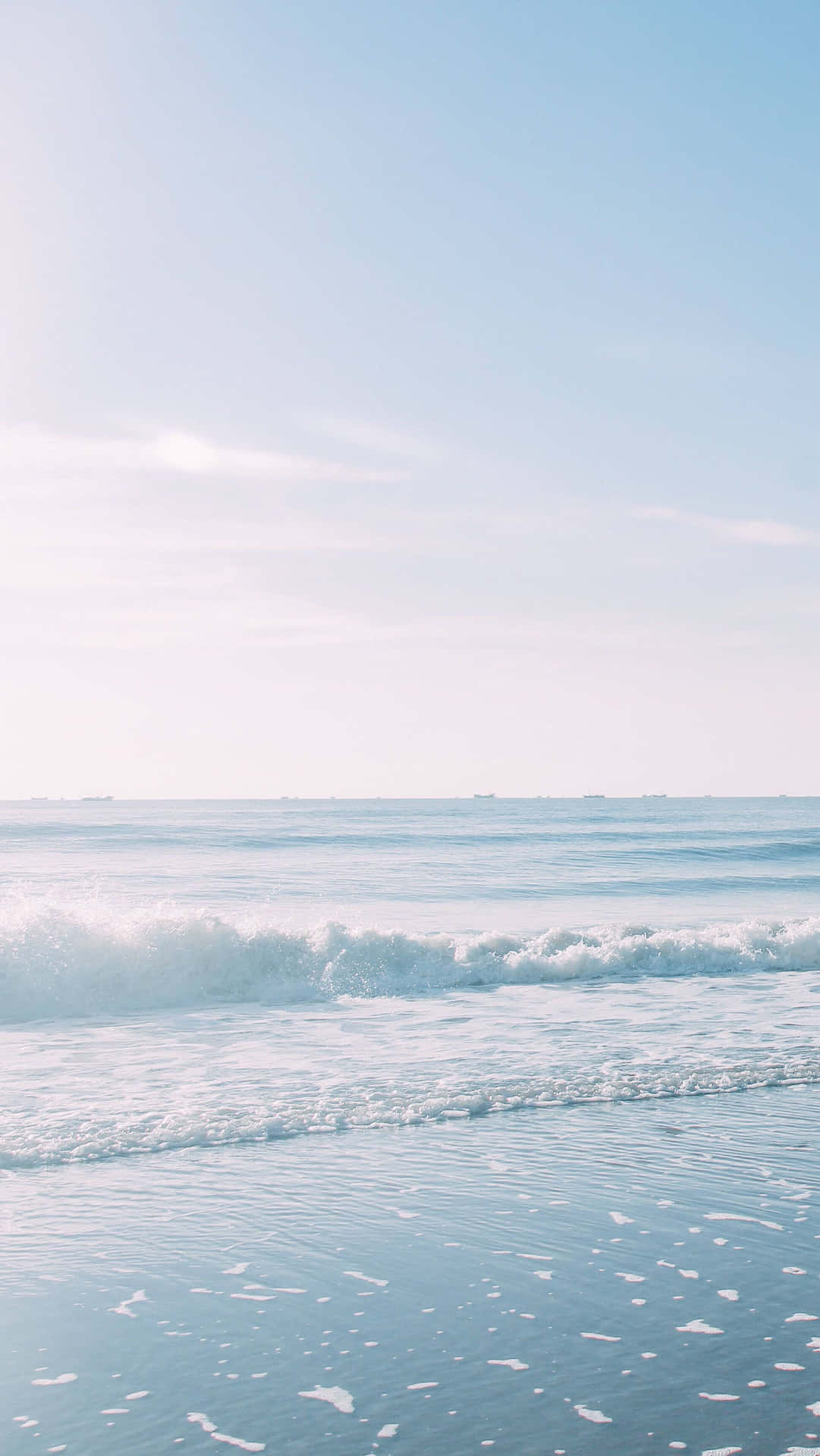 A Woman Is Standing On The Beach Background