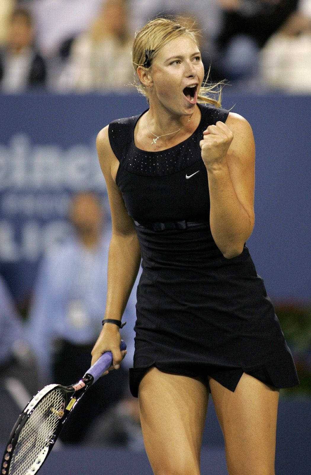 A Woman Playing Tennis Background