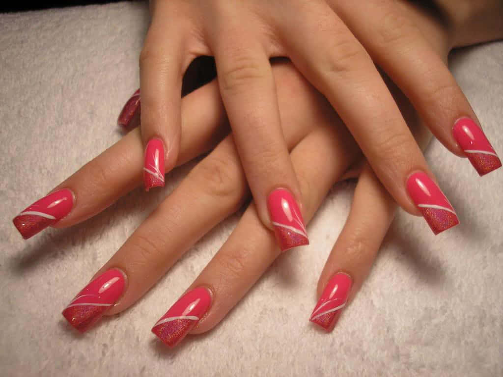 A Woman's Hands With Pink And White Nails Background