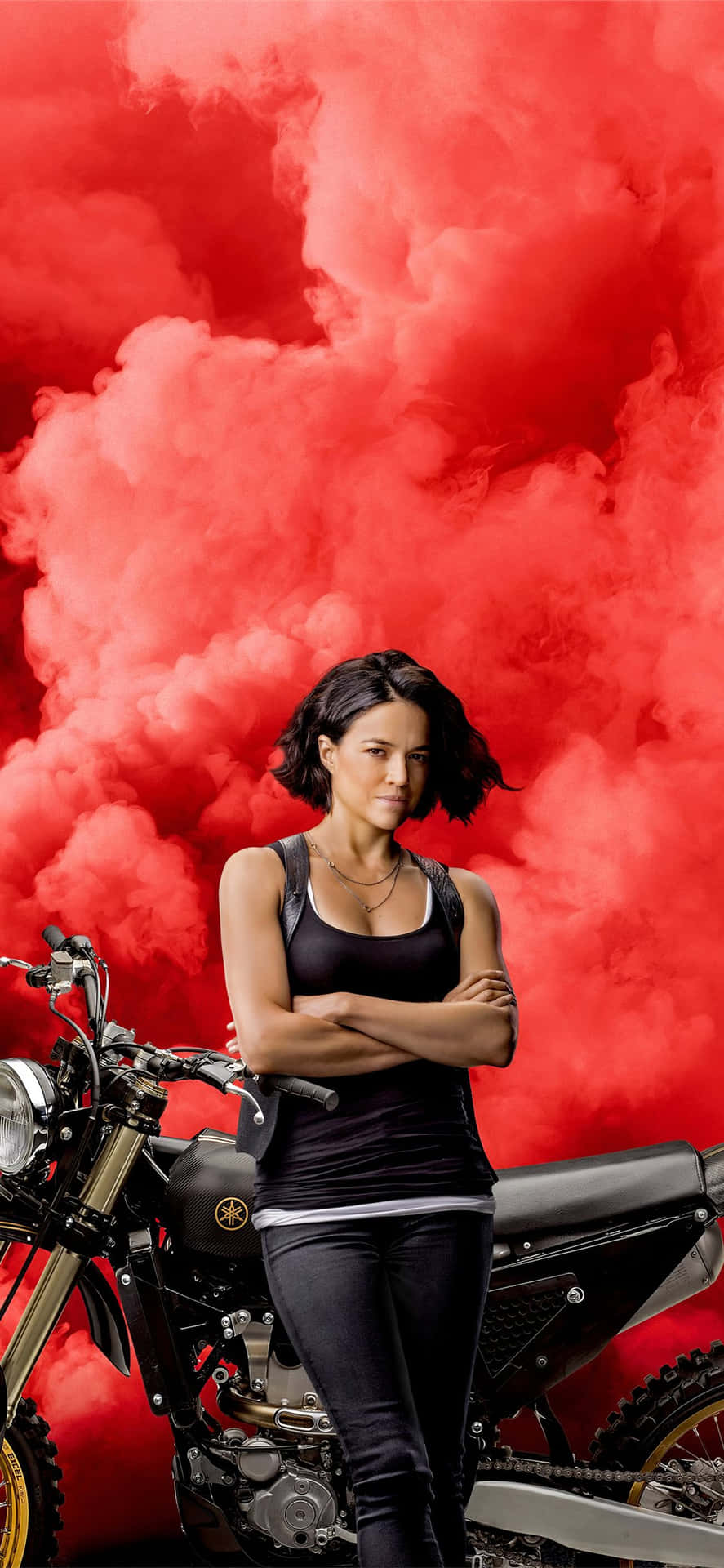 A Woman Standing Next To A Motorcycle Background