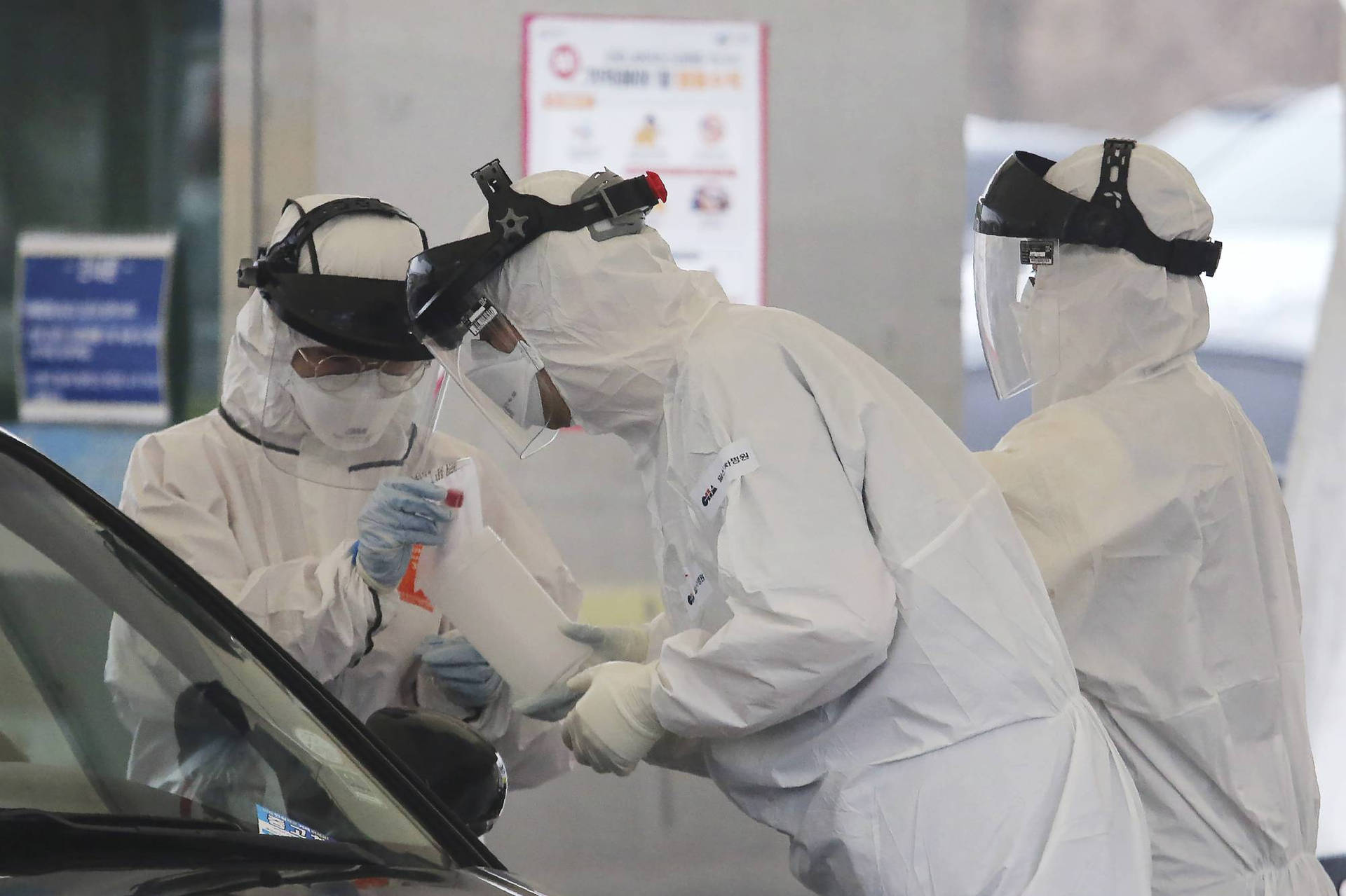 A Woman Wearing A Protective Face Mask Against Covid-19