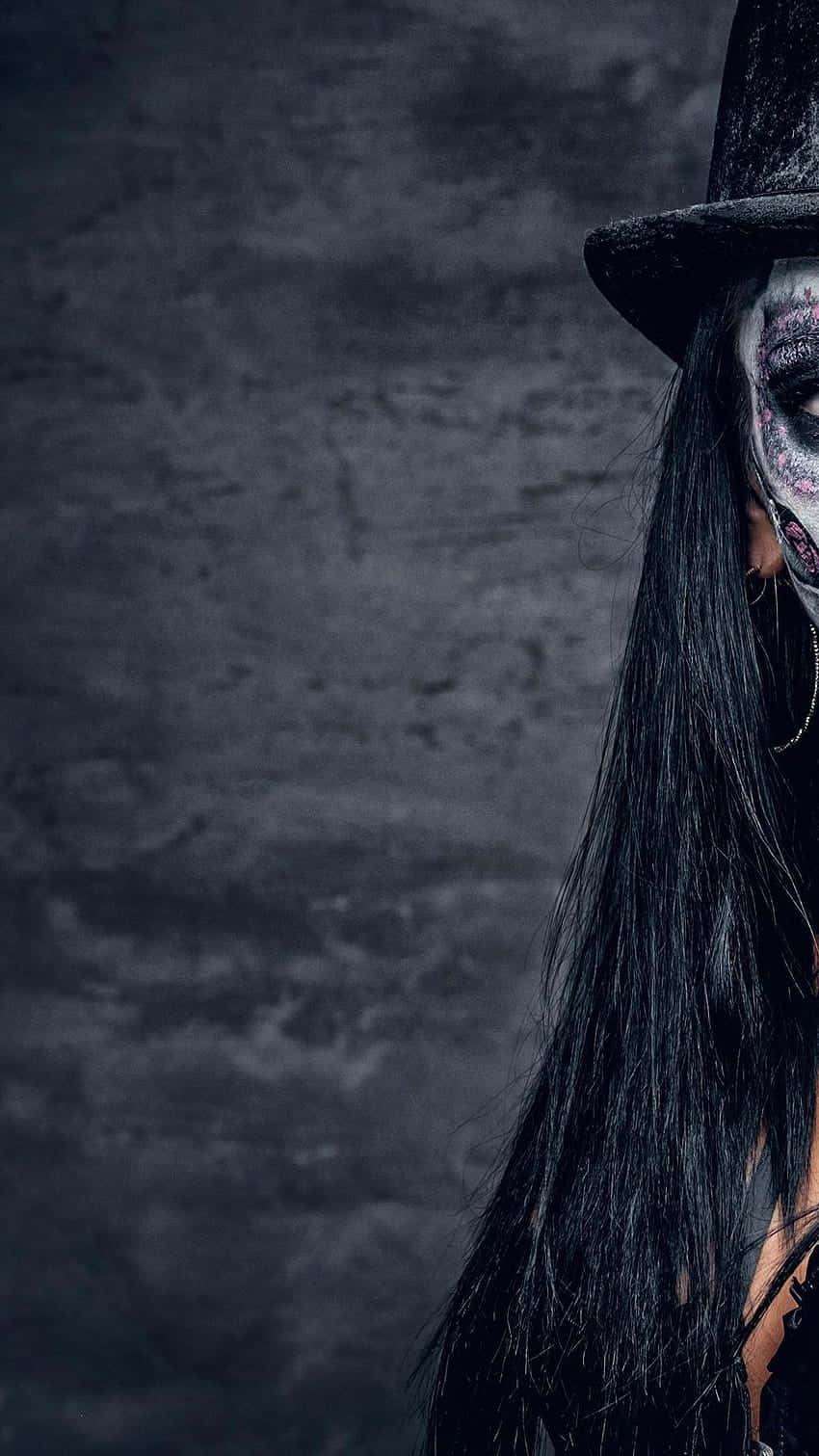 A Woman With A Black Mask And Hat Background