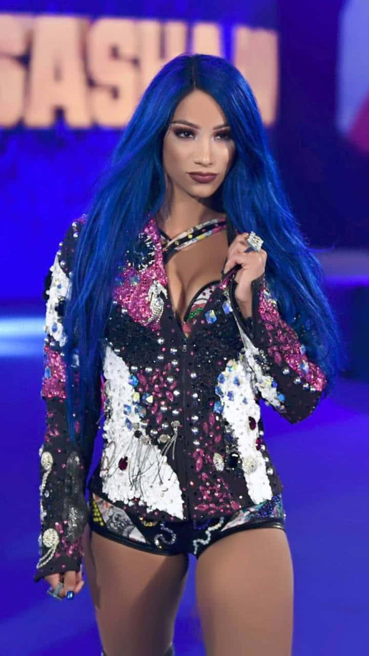 A Woman With Blue Hair On Stage