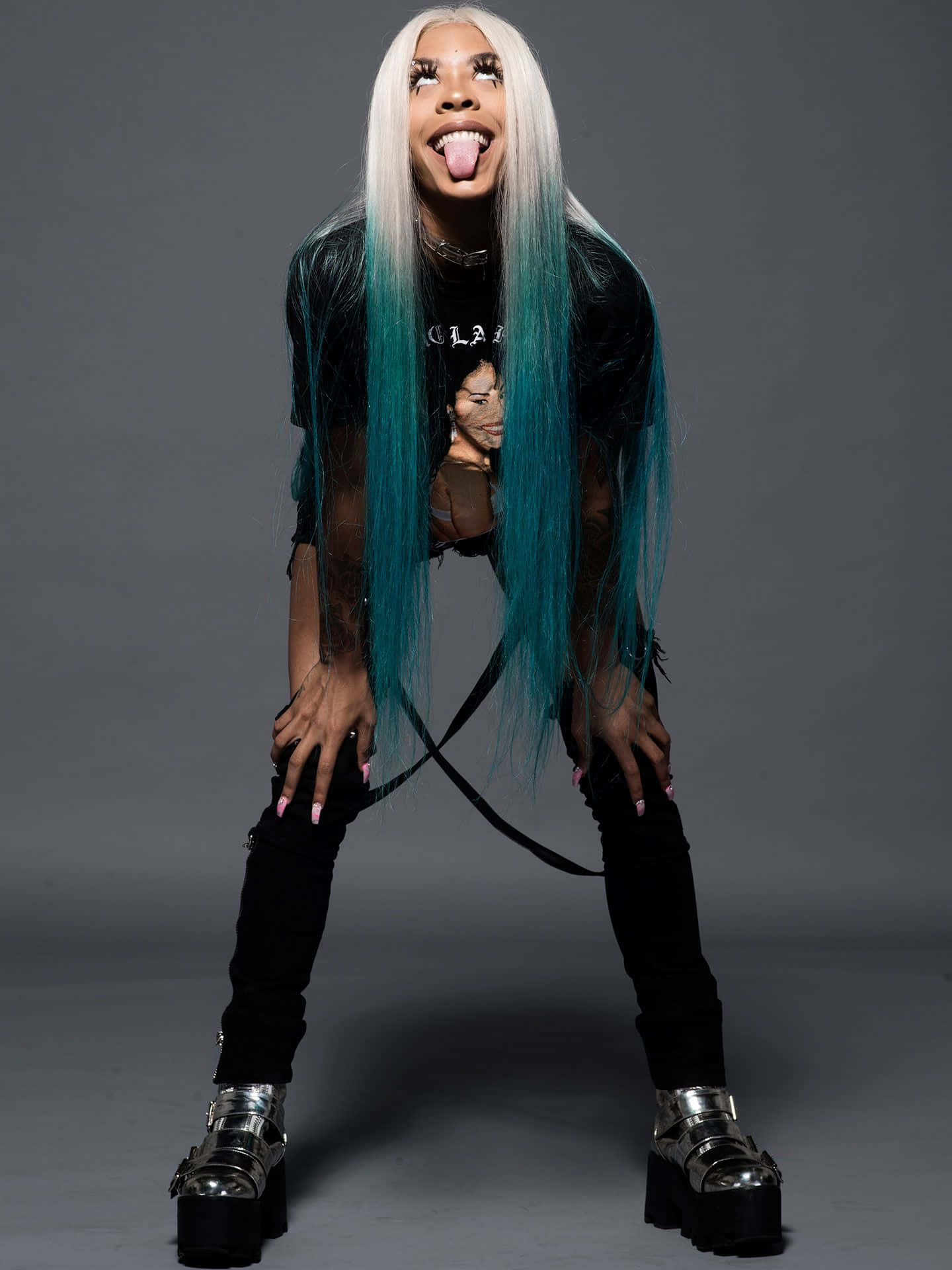 A Woman With Blue Hair Posing For A Photo Background
