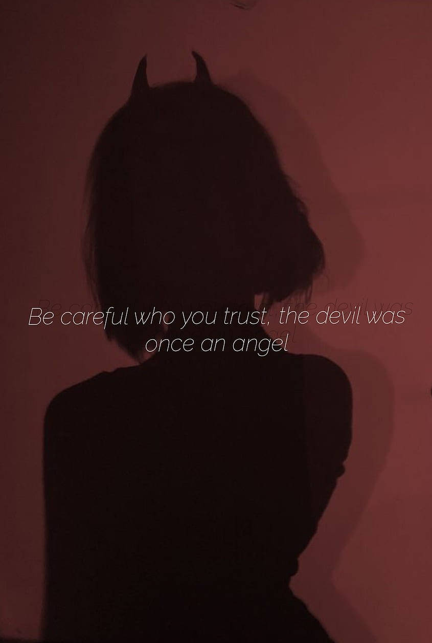 A Woman With Horns And A Quote That Says, Be Careful Who You Trust Background