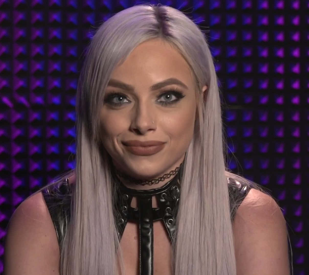 A Woman With Long Blonde Hair And Purple Hair Background