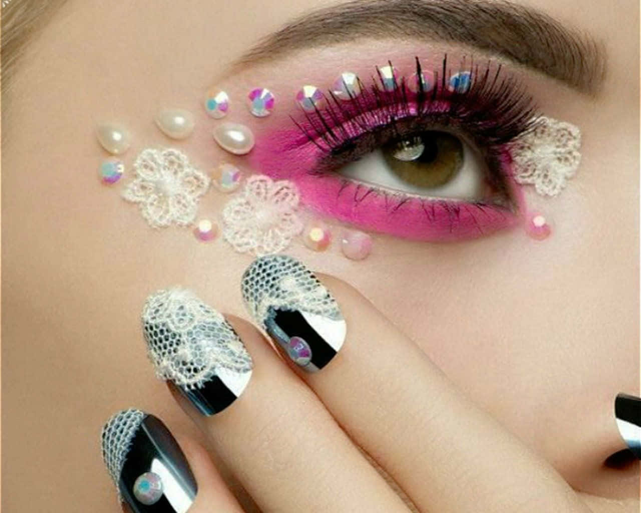A Woman With Pink And White Nails And Lace Background