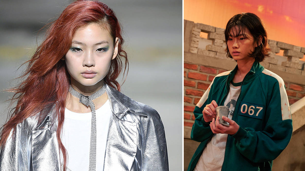 A Woman With Red Hair And A Man With Silver Hair Background