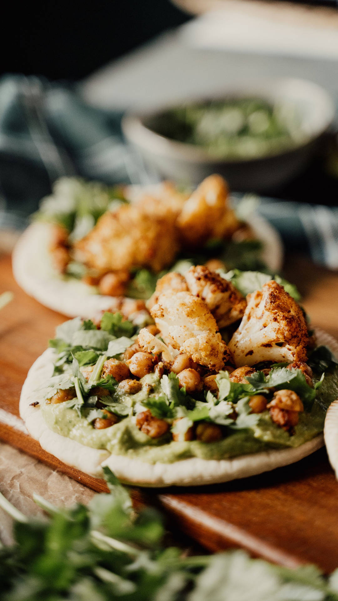 A Wooden Cutting Board With A Few Chicken Tacos On It Background