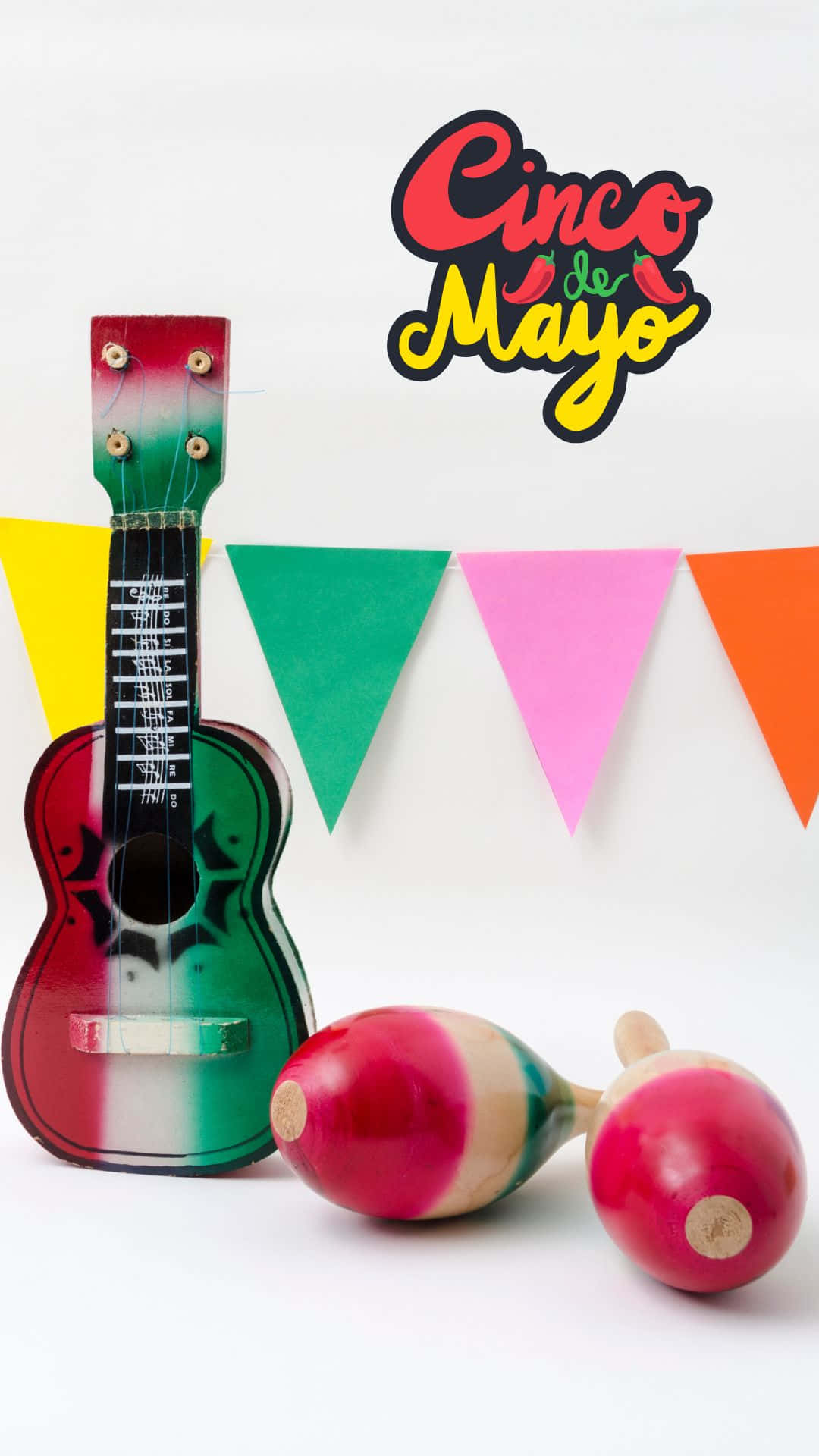 A Wooden Ukulele And Maracas Are On A Table Background