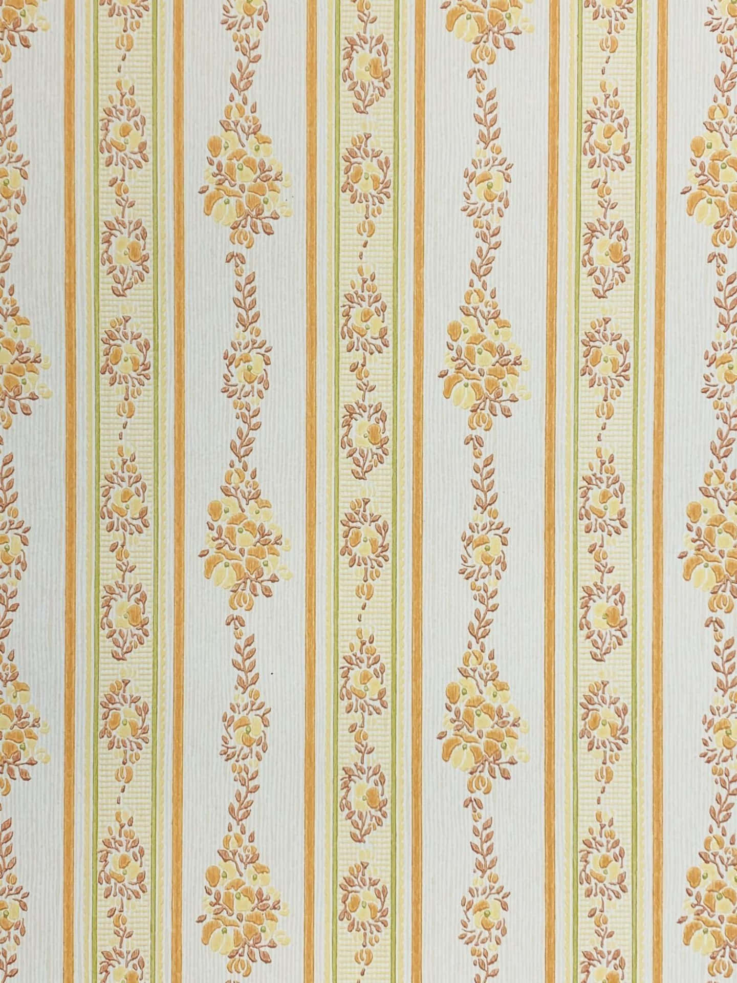 A Yellow And White Striped Wallpaper With Floral Designs