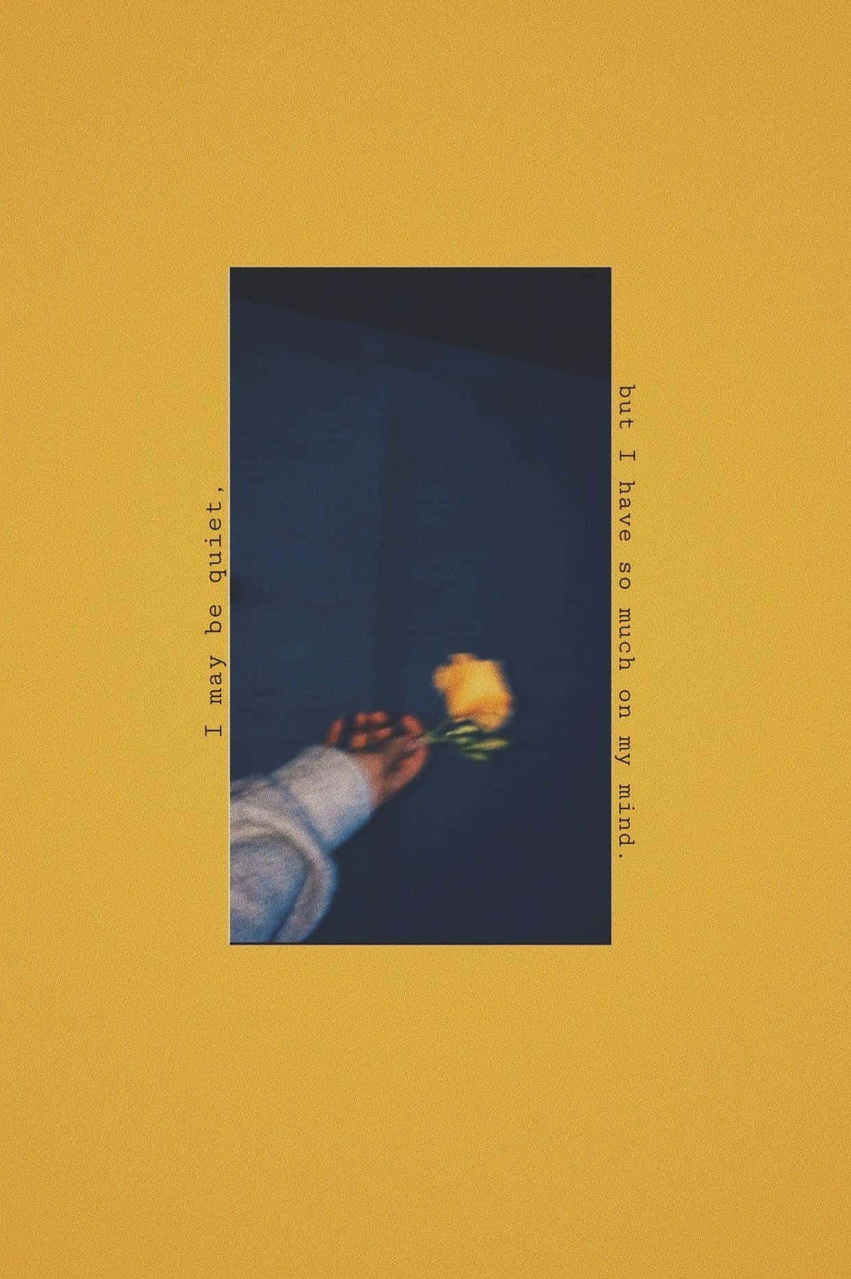 A Yellow Background With A Hand Reaching Out To A Flower Background