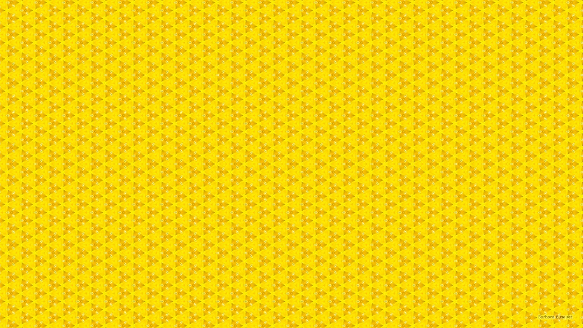 A Yellow Background With A Pattern Of Dots Background