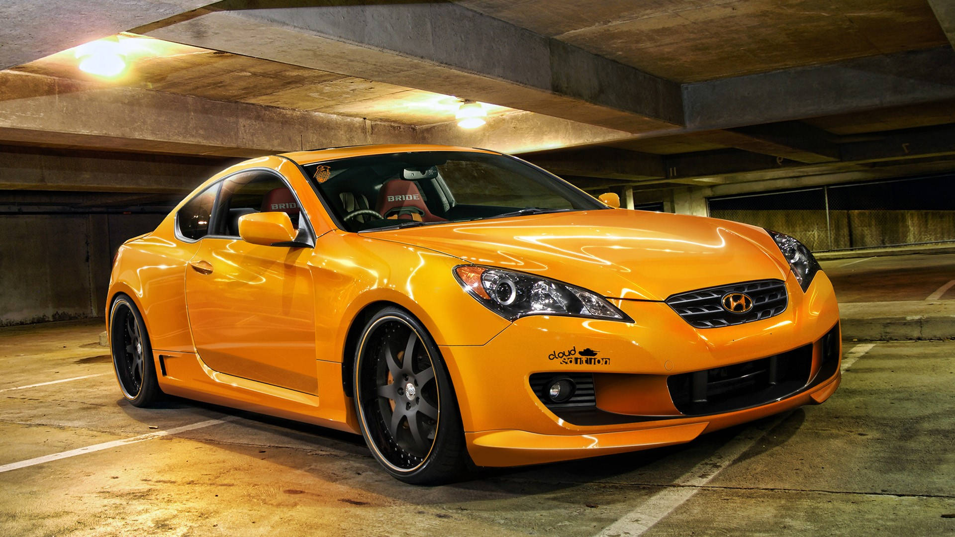 A Yellow Sports Car Parked In A Garage