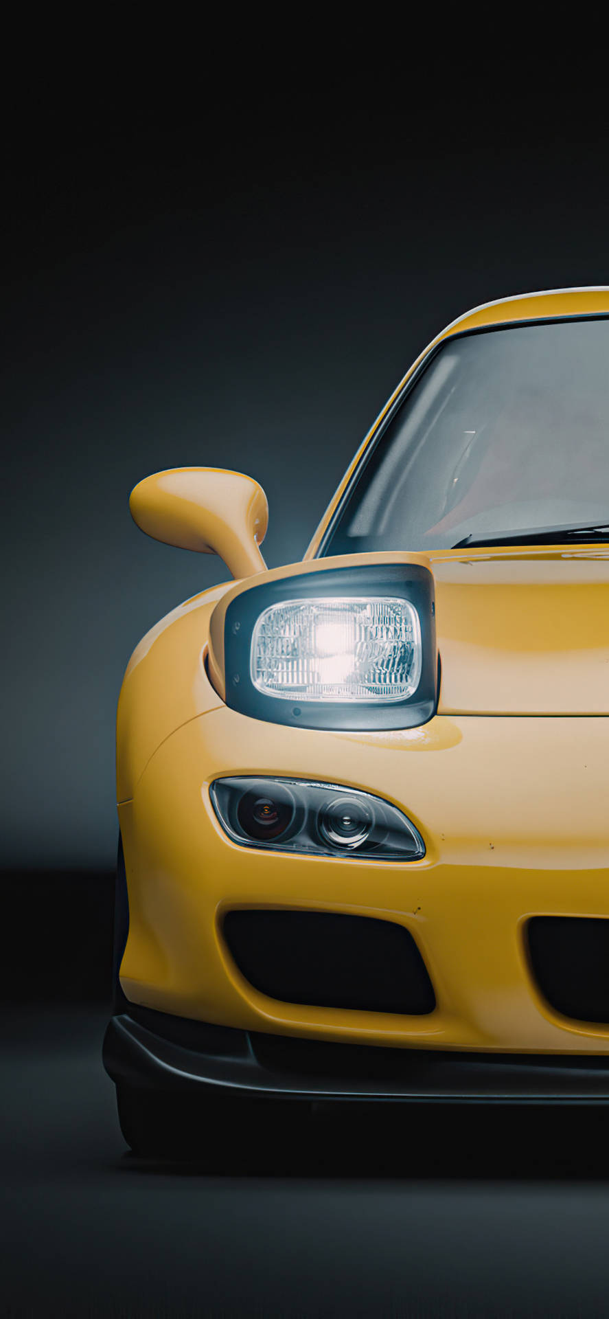 A Yellow Sports Car With A Black Background Background