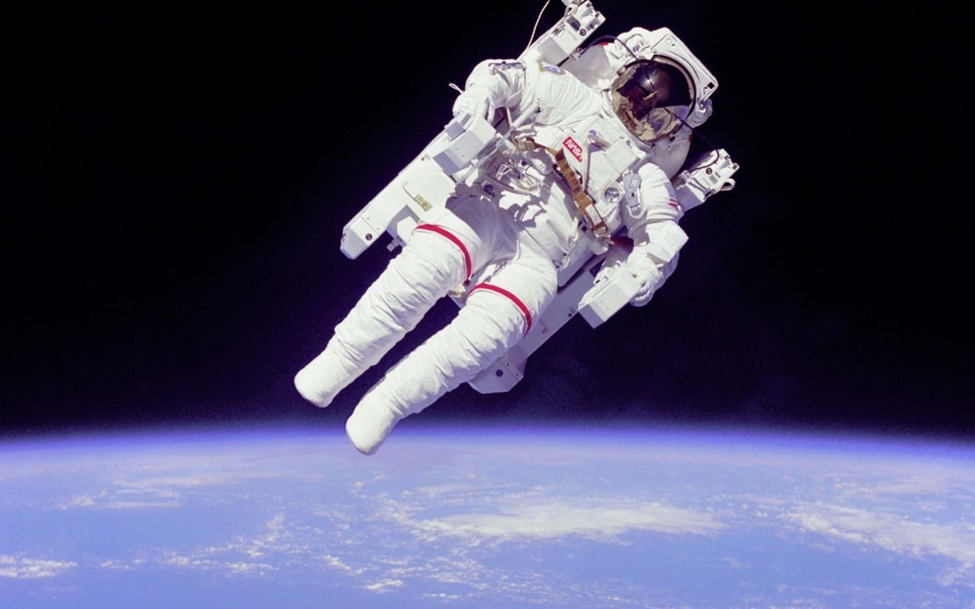 A Young Astronaut Explores The Vastness Of Space Background