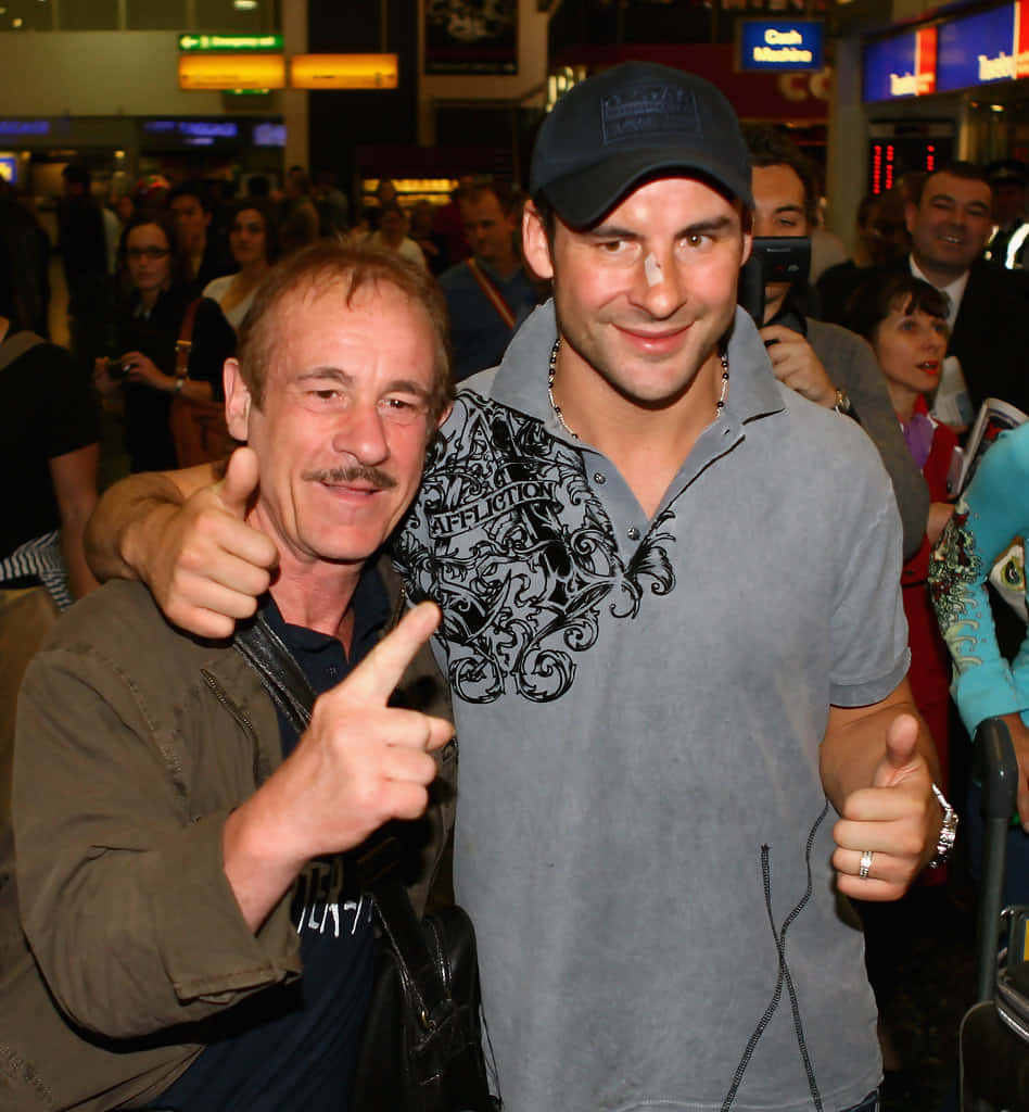 A Young Joe Calzaghe With His Coach Background