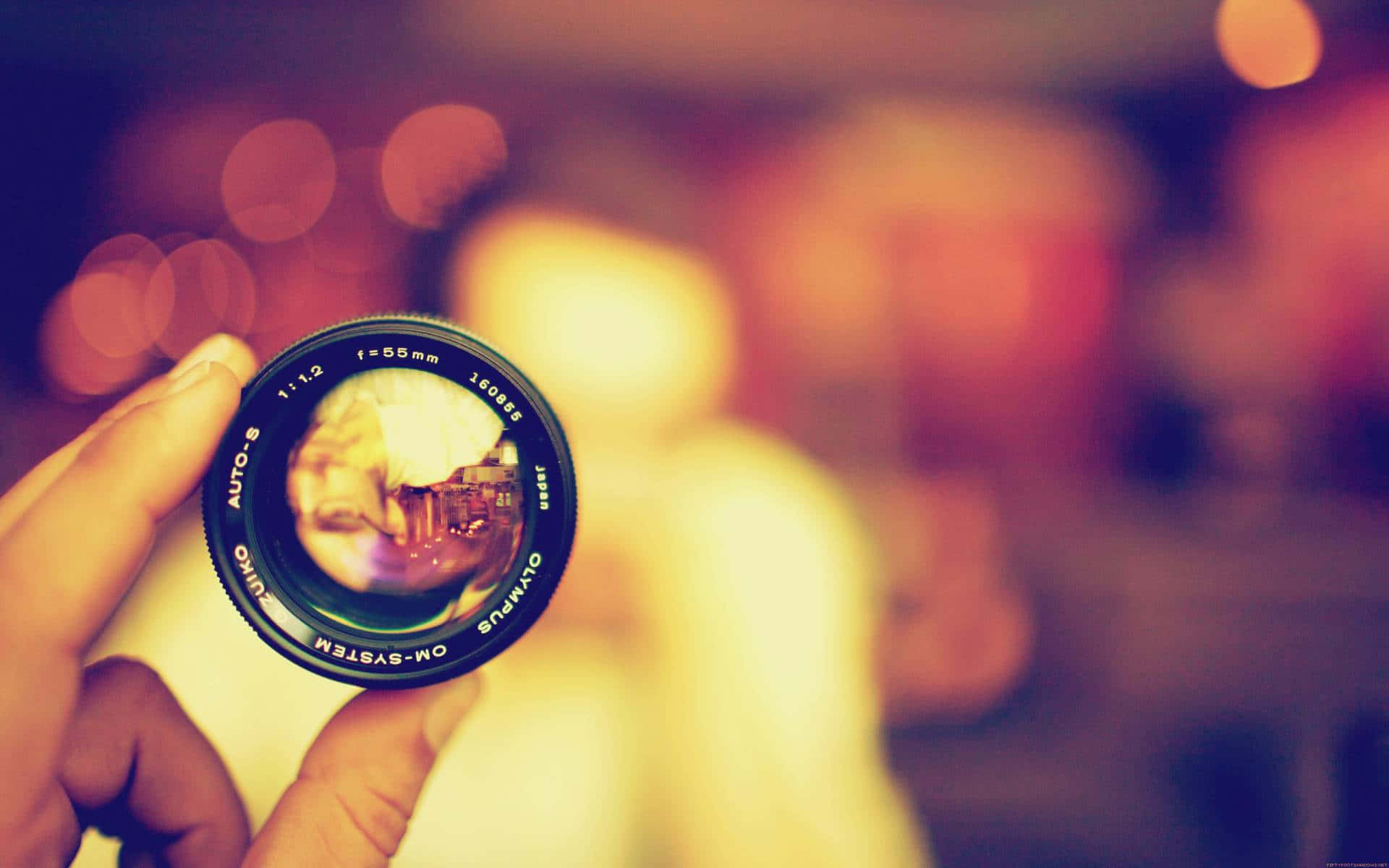 A Young Photographer Taking A Photo Of Nature Background