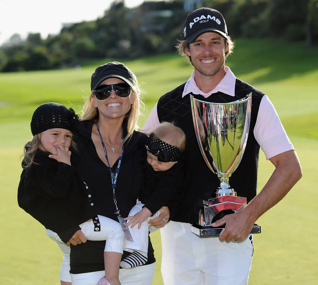 Aaron Baddeley Trophy With Family Background