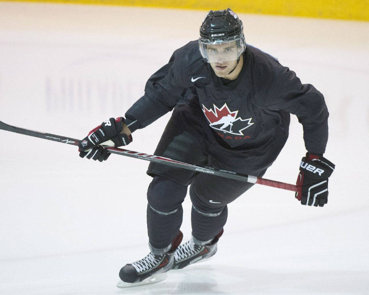 Aaron Ekblad In Action During National Junior Team Summer Camp Background