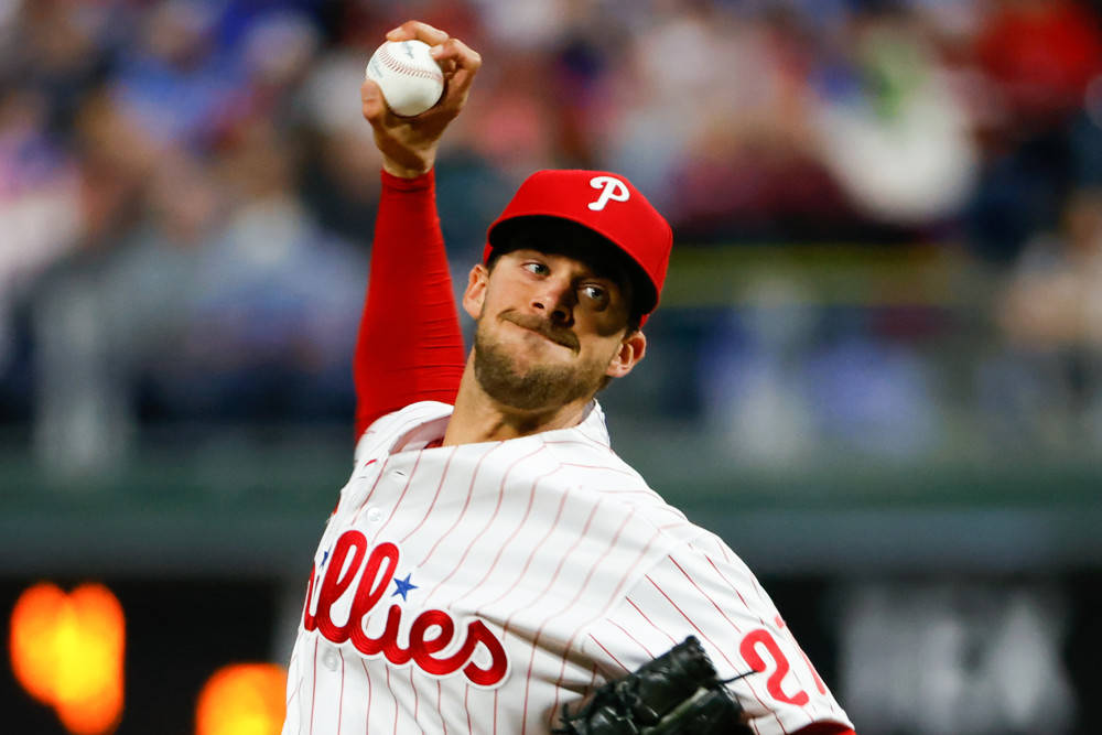 Aaron Nola Gripping Ball Background