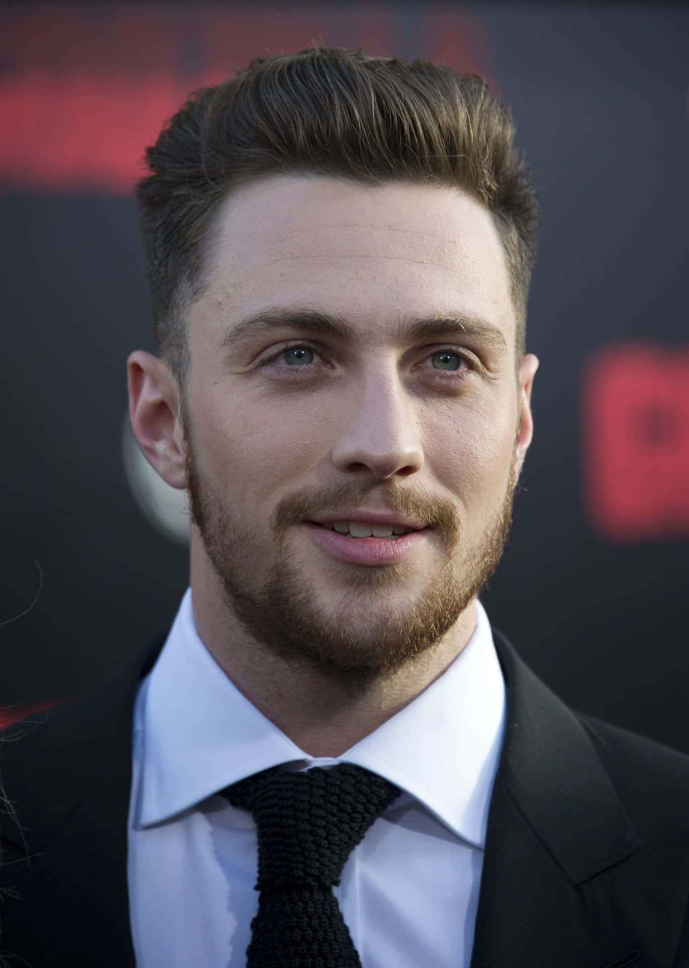 Aaron Taylor Johnson: The Epitome Of Hombres Guapos Background